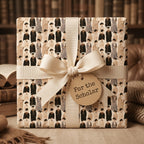 Vintage graduation wrapping paper with academic scholar print and cream ribbon by Wrapped Studios.