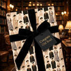 Dark academia vintage wrapping paper featuring a black velvet bow and Congrats gift tag by Wrapped Studios.