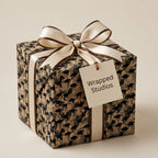Vintage graduation wrapping paper featuring a photo print of graduates and cream ribbon by Wrapped Studios.