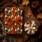 Spooky ghost and pumpkin Halloween wrapping paper on luxury gifts by Wrapped Studios.