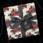 Vintage music sheet and holly Christmas wrapping paper with a grey bow by Wrapped Studios.