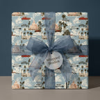 Vintage car wrapping paper with palm trees and a blue organza bow by Wrapped Studios.