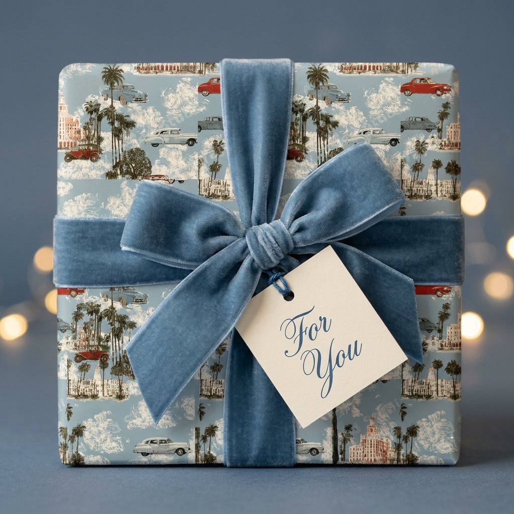 Retro classic car luxury gift wrap with a blue velvet ribbon and tag by Wrapped Studios.