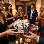 Elegant jellyfish wrapping paper with cream satin bow on a gift at a party by Wrapped Studios.