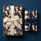 Luxury navy jellyfish wrapping paper on gift boxes with cream and blue satin bows by Wrapped Studios.