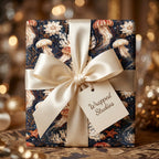 Luxury navy blue jellyfish wrapping paper with cream satin bow by Wrapped Studios.