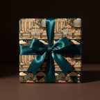 Vintage Art Deco wrapping paper with a teal satin bow. Luxury gift wrap by Wrapped Studios.