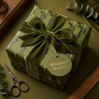 Vintage military soldier wrapping paper by Wrapped Studios on a gift box with a luxury olive green velvet bow.
