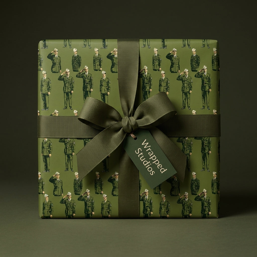 Military wrapping paper with a saluting soldier pattern and olive green ribbon bow by Wrapped Studios.