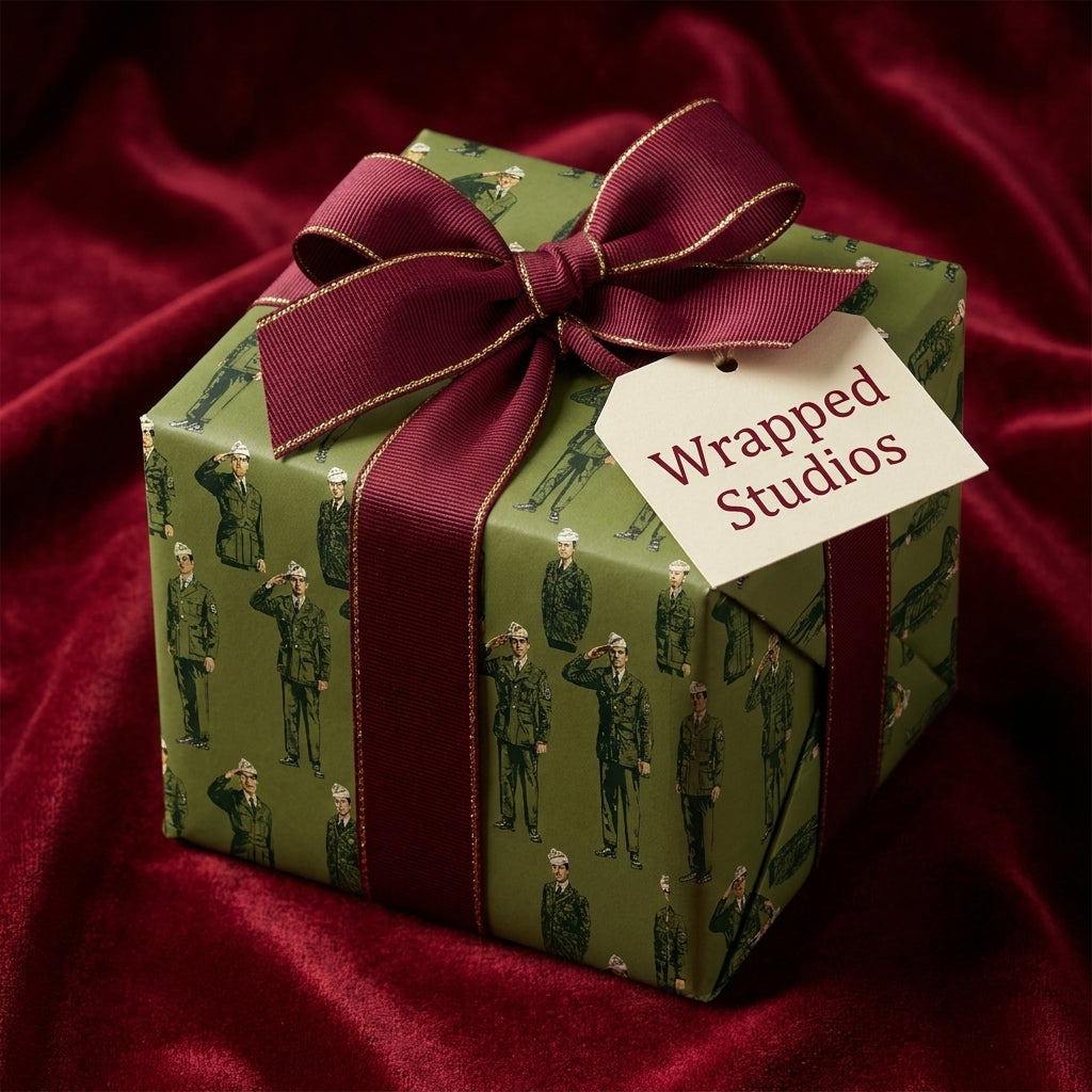 Patriotic military wrapping paper with saluting soldiers and burgundy ribbon, by Wrapped Studios.