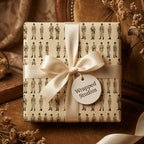 Vintage military soldier wrapping paper on a gift box with a cream satin ribbon by Wrapped Studios.