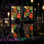 Retro monster Halloween wrapping paper with a black bow and gift tag by Wrapped Studios.