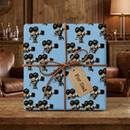 Vintage camera wrapping paper on a Father’s Day gift with a 'For Dad' tag, by Wrapped Studios.