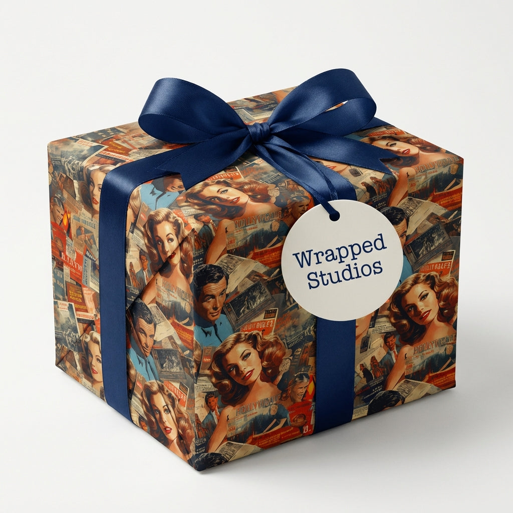 Gift box wrapped in vintage Hollywood starlet themed wrapping paper, finished with a navy satin ribbon and "Wrapped Studios" tag.