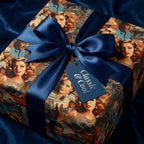 Gift wrapped in a luxury paper featuring a vintage Hollywood design with a navy satin bow.