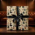 Square gift wrapped in guitar-themed birthday wrapping paper with a black ribbon and a tag that says "Rock On!".