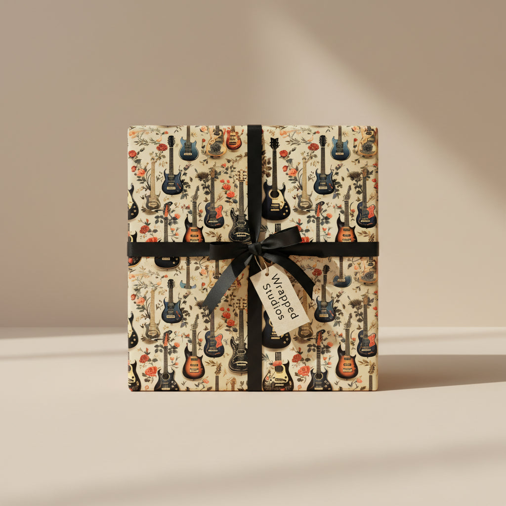 Gift wrapped in guitar and floral wrapping paper, finished with black ribbon.