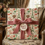 Vintage Paris wrapping paper with Eiffel Tower pattern and pink velvet bow by Wrapped Studios.