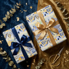 Luxury Paris wrapping paper with gold and navy satin bows by Wrapped Studios.