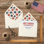 Patriotic 4th of July star envelope liners and invitations on rustic wood by Wrapped Studios.