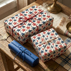 Red, white, and blue star patriotic wrapping paper on rustic gift boxes by Wrapped Studios.