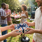 Patriotic wrapping paper with red and blue stars on a gift passed at a backyard party by Wrapped Studios.
