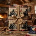 Rustic patriotic wrapping paper with American flag Christmas trees and burlap bow by Wrapped Studios.