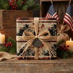 Rustic patriotic wrapping paper with a vintage American flag pattern and raffia bow by Wrapped Studios.
