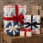 Patriotic Christmas wrapping paper with red and blue star tree patterns by Wrapped Studios.