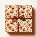 Rustic pheasant and floral wrapping paper with brown satin ribbon on a gift box, by Wrapped Studios.