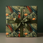 Square gift wrapped in vintage floral wrapping paper with peacock and green ribbon.