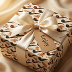 Vintage tobacco pipe wrapping paper with cream satin bow on a Father's Day gift by Wrapped Studios.