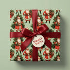 Vintage Christmas wrapping paper with sage green Santa pattern and red ribbon bow by Wrapped Studios.