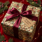 Vintage Santa Claus Christmas wrapping paper with a luxury burgundy bow by Wrapped Studios.