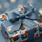 Vintage blue Santa Christmas wrapping paper with a matching ribbon bow and tag by Wrapped Studios.