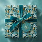 Luxury coastal seahorse wrapping paper with teal velvet bow by Wrapped Studios.