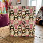 Retro movie night wrapping paper with 1950s women and popcorn on a gift box by Wrapped Studios.