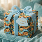 Vintage teddy bear wrapping paper with a blue velvet bow on a baby shower gift by Wrapped Studios.