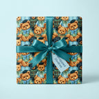Cute teddy bear wrapping paper with a teal satin bow on a gift by Wrapped Studios.