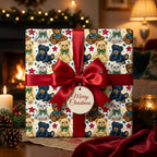 Vintage teddy bear Christmas gift wrap with a red bow by a cozy fireplace, from Wrapped Studios.