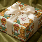 Vintage teddy bear wrapping paper with cream satin bow and 'with love' tag by Wrapped Studios.