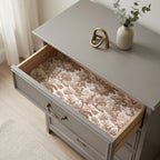 Brown vintage toile wrapping paper used as a drawer liner in a grey dresser, by Wrapped Studios.