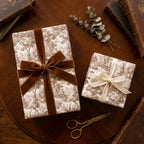 Vintage brown toile wrapping paper with luxury velvet ribbon by Wrapped Studios.