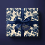 Luxury blue toile castle wrapping paper with navy satin ribbon by Wrapped Studios.