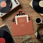 Retro vinyl party invitation in a terracotta envelope with record pattern liner by Wrapped Studios.