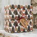 Christmas wrapping paper with tree pattern and 'No Peeking' tag on rustic gift box by Wrapped Studios.