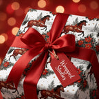 Cowboy Christmas wrapping paper featuring galloping horses and a large red bow, by Wrapped Studios.