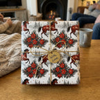 Equestrian Christmas wrapping paper with vintage horses and poinsettias by Wrapped Studios.