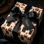 Vintage whiskey wrapping paper with a luxury black satin bow on a gift box by Wrapped Studios.