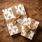 Rustic farmhouse windmill gift wrap tied with burlap ribbon bows on a wood background, by Wrapped Studios.